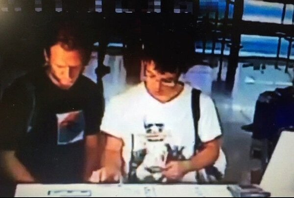 一銀ATM盜領案兩名嫌犯在桃機租車處。 圖/機場提供