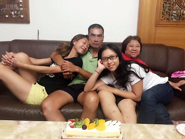 1. 體育夫妻檔溫進鴻與鄭麗月,一家和樂住在楊梅社區。