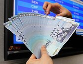 熱錢流竄狂買美元　新台幣短線偏強