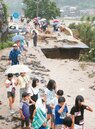 道路變河流！豪雨重創日本九州　自衛隊進駐救災