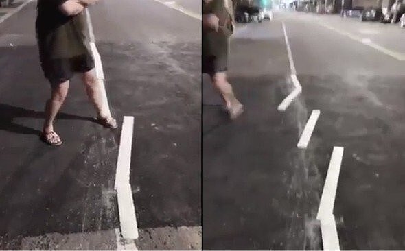 有民眾在臉書社團「爆料公社」傳影片,指湖內區一段道路上的白色標線,竟輕輕一踢,就斷成好幾截。 圖/取自爆料公社