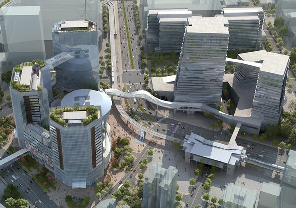 台灣人壽南港C3開發案為黃金級綠建築，辦公室總共分為三棟玻璃帷幕大樓，與同樣也是三棟大樓之中信金融園區相互輝映。（圖／台壽）