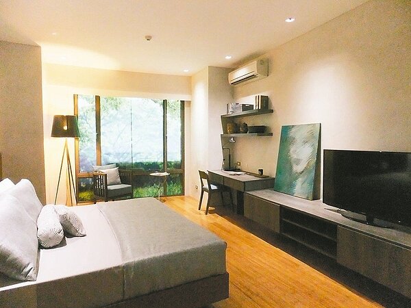 一名網友在PTT上請益,一間1千萬的房子,與2間5百萬的房子,應該怎麼選。 示意圖/聯合報系資料照片