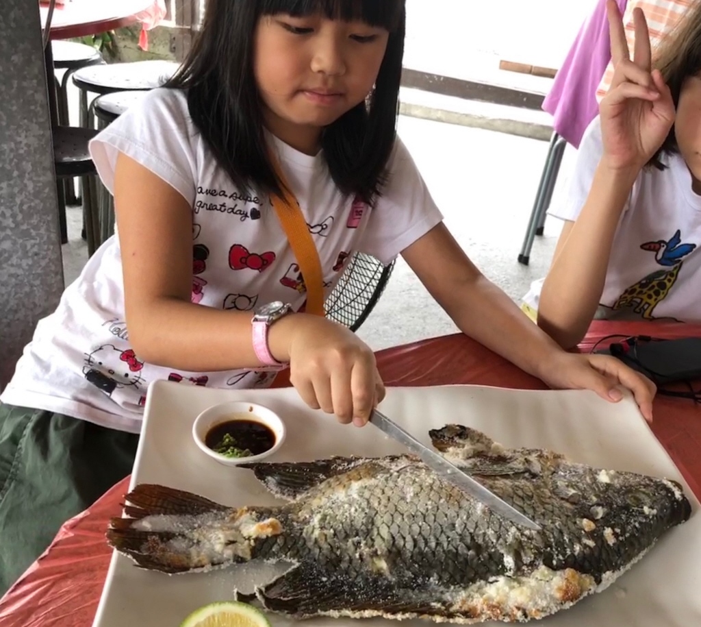 小朋友吃魚。聯合報系資料照／記者陳易辰攝影