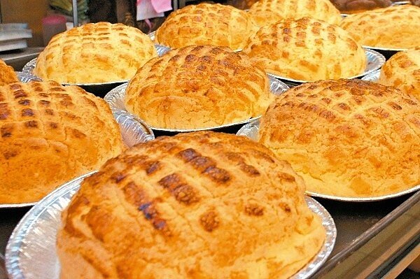 身為台式麵包中的經點款,菠蘿麵包的魅力幾乎是無人不愛。(圖/聯合報系檔案照)