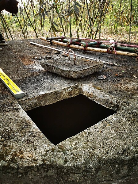 呂警官夫妻中毒死亡的水塔僅有一處出入口且用水泥蓋長年密封。記者蔡維斌/翻攝