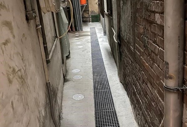 第三市場後巷水溝及臭味均改善(施工後)。圖/台中市水利局提供