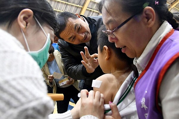 圖為去年校園疫苗施打情形。圖/新北市政府提供