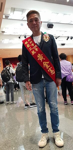 全新北市「唯一」當選模範父親的里長。圖／記者姚香攝影