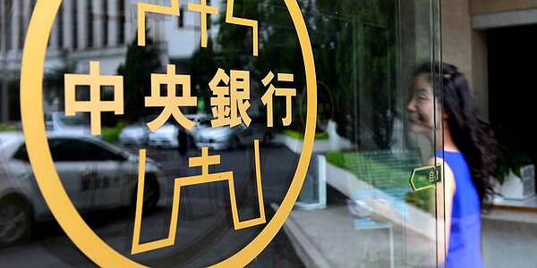 美國10月發布報告,可能將三項全中減為符合兩項,但仍暫無法除名。圖/中時電子報資料照片