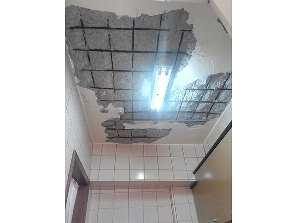 「松山延壽國宅J區案」住戶飽受海砂屋安全危害陰影。圖/北市都市更新處提供