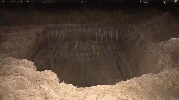 彰化縣二林鎮東勢里農地被開挖掩埋廢棄物。記者簡慧珍/翻攝