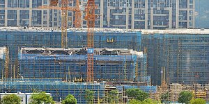 自大陸政府推出穩房市「三支箭」政策以來,為陸地產商融資吹來暖風。 圖/中新社