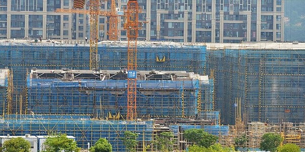 自大陸政府推出穩房市「三支箭」政策以來,為陸地產商融資吹來暖風。 圖/中新社