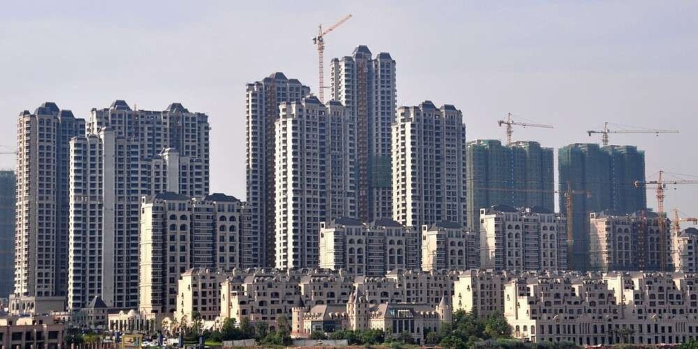 業界分析指出,碧桂園的開發項目數量是恒大集團的四倍,若碧桂園違約,事態恐將比恒大更嚴重。圖/新華社