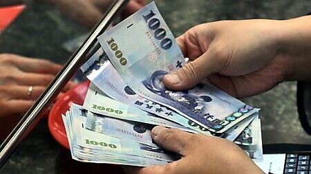 今年上半年亞洲貨幣走勢偏弱,央行小幅調節匯市淨賣匯8.8億美元。圖∕本報資料照片