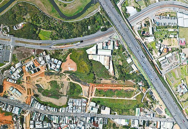 中壢A21站重劃區開發工程施工地貌鳥瞰圖,預計明年2月完工交地。圖/桃市府新工處提供