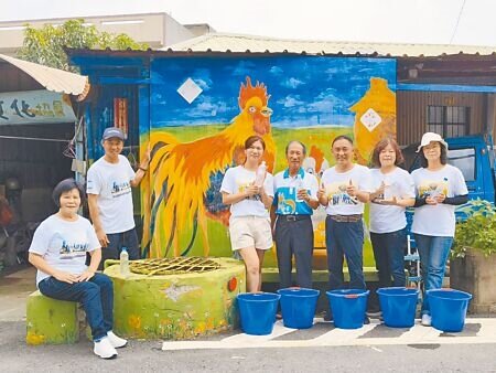 嘉義市大溪社區發展協會歡迎大家到社區取「午時水」,可淨身除穢。(廖素慧攝)