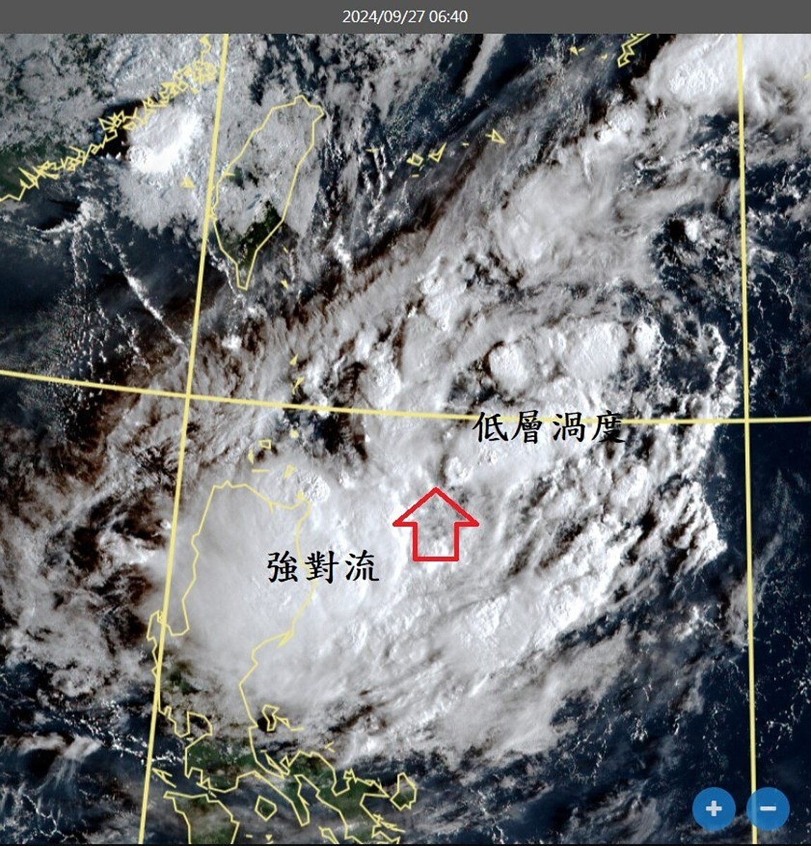 雲圖上，有個低雲環繞的旋轉中心在箭頭處發展。圖／取自中央氣象署網站