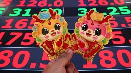 台股金龍年五大天王出列,台積電強取市值王、定期定額王;信驊登上股王大位;漲幅王、當沖王則由合騏、興能高拿下。圖∕本報資料照片