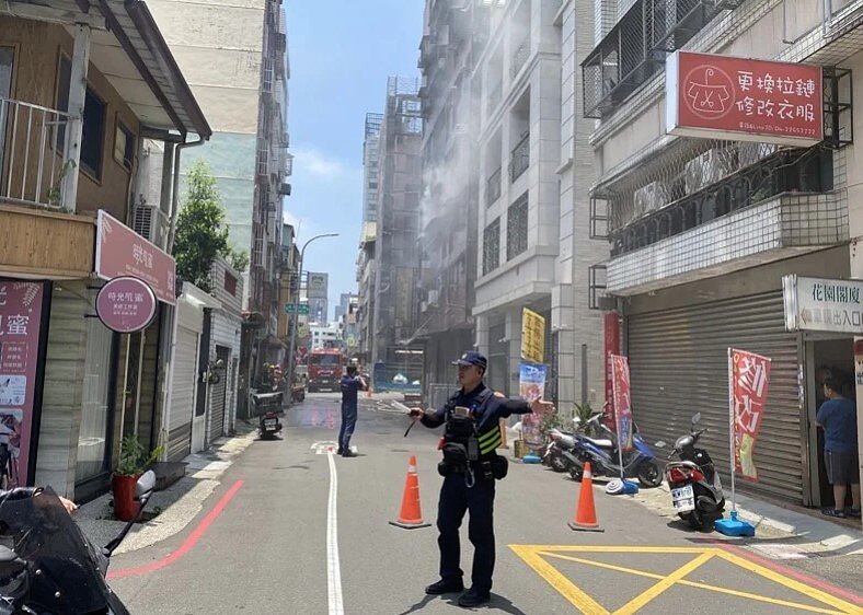 台中北區太原八街1棟住宅大樓4樓31日中午傳出火警。圖／警方提供
