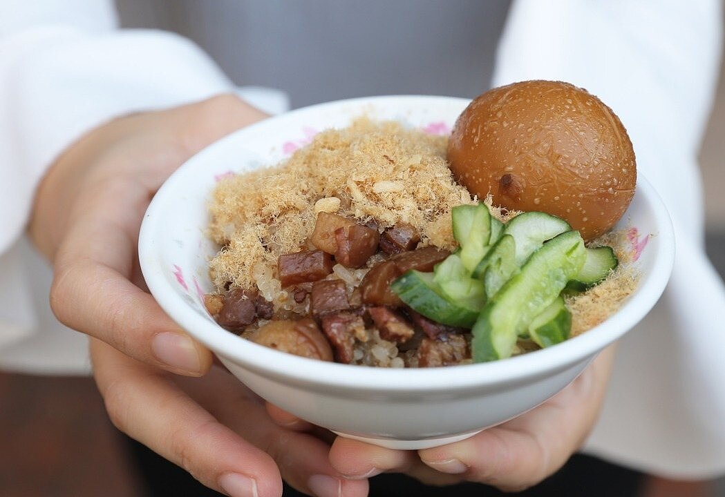 高雄鹽埕區大仁路的「米糕城」,是許多老鹽埕人記憶中的好味道。圖/聯合報系資料照