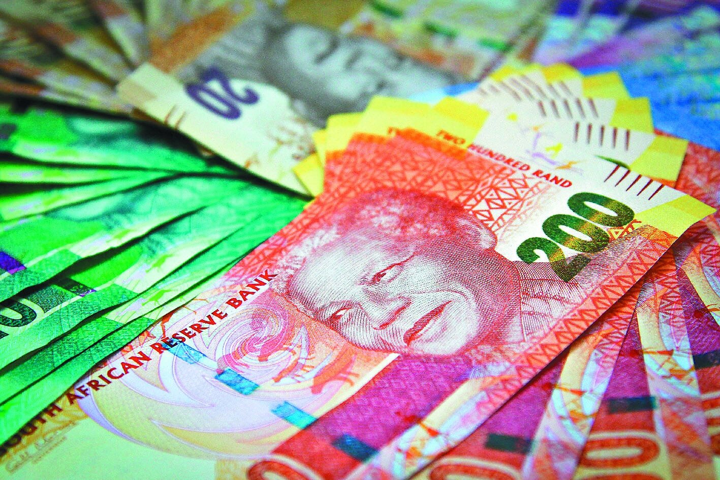 外幣定存利率有機會比台幣存款高,可以做為理財選項之一。 本報系資料照片