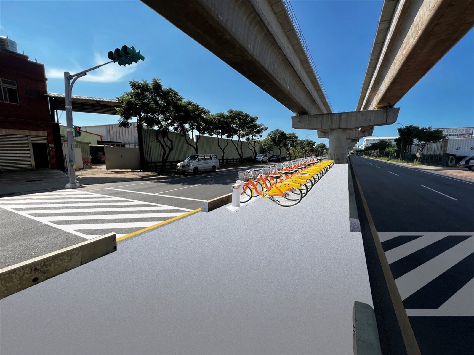 捷工局利用捷運施工落墩後變寬的中央分隔島，於分隔島規劃自行車停車空間。圖：捷工局提供