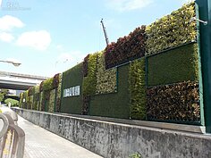綠化組佳作－忠泰建設濱江段新建工程
本案是由忠泰建設特別委託日本知名建築師-青木淳建築師設計，王克誠、林連璋建築師規劃，並由華熊營造負責營造管理；青木淳建築師特別將兩種厚度的陶磚透過九種巧妙的排列組合，營造出深邃而細膩的層次感